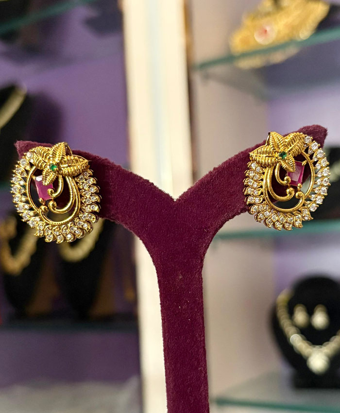 Buy Elegant Earrings with Dazzling White Stones and Matte Gold Shade online