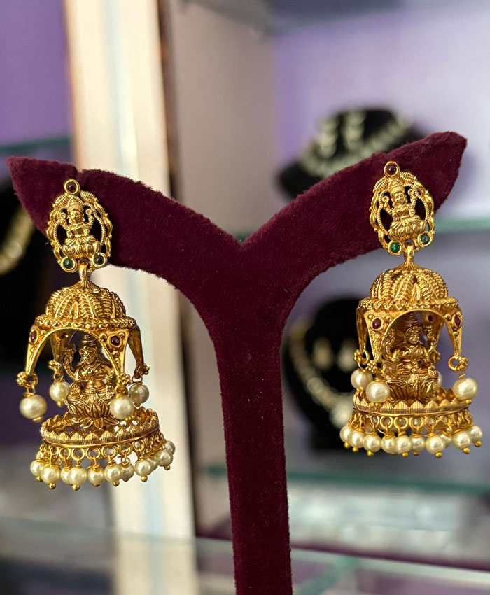 Buy Divine Temple Jhumka Earrings of Auspicious Lakshmi and Pearl Drops online